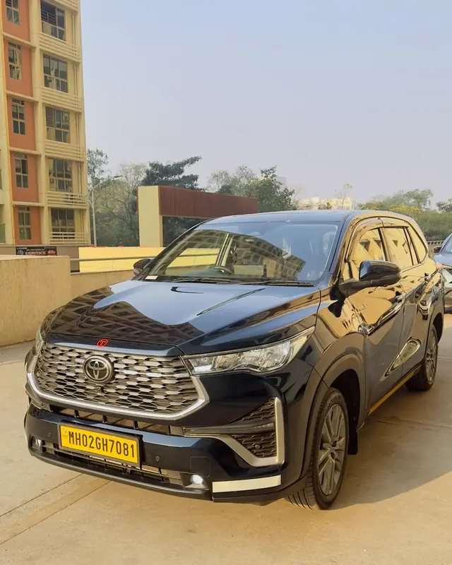 Innova Hycross ZX Top with chauffeur, ready for an outstation trip