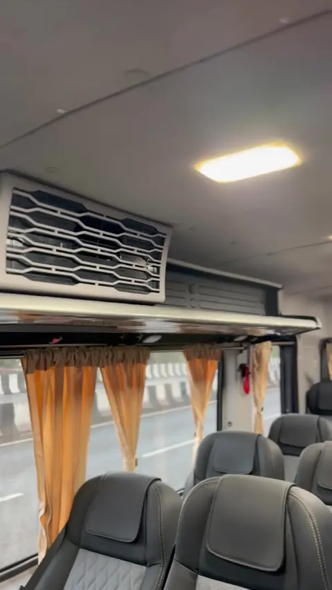 Roof AC ducting and lights above the seats in the Force Urbania