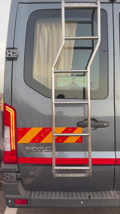 Rear of the Force Urbania with a steel ladder to the roof carrier
