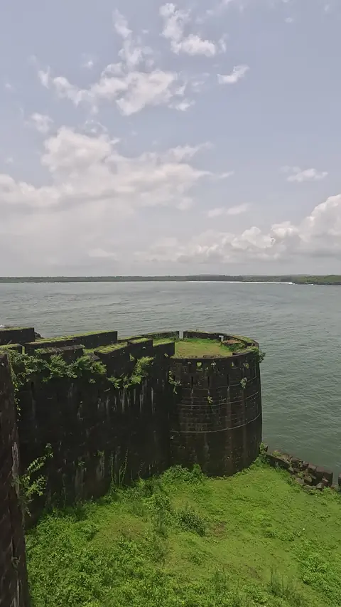 Vijaydurg Fort rampart above the creek